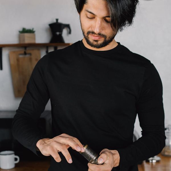 Man in a meditative but strong pose, symbolizing mental focus and clarity.